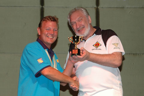 Rich Brown collects Player of the Spoon Final trophy